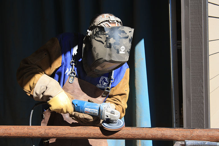 Scott metalworking with grinder